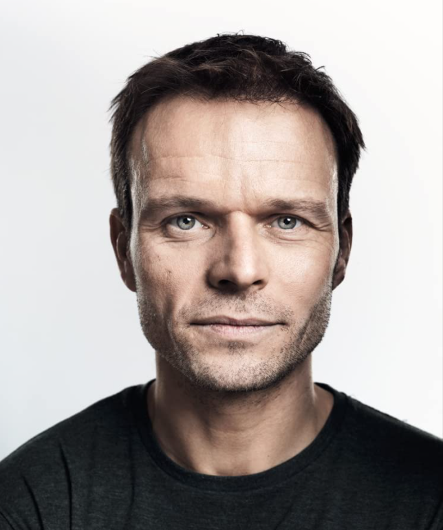 Alec Newman headshot photo.